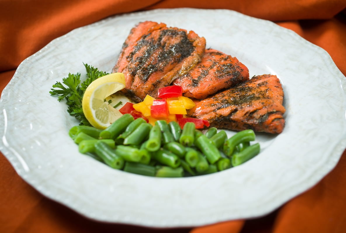 Lemon salmon on a white plate