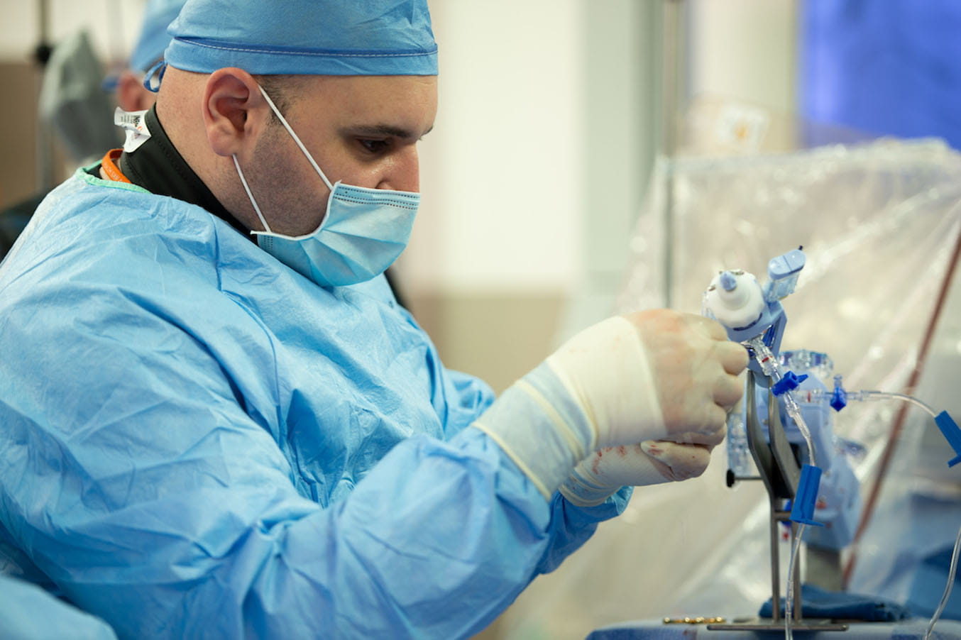 Interventional Cardiologist Ahmed Almomani, M.D. in surgery.