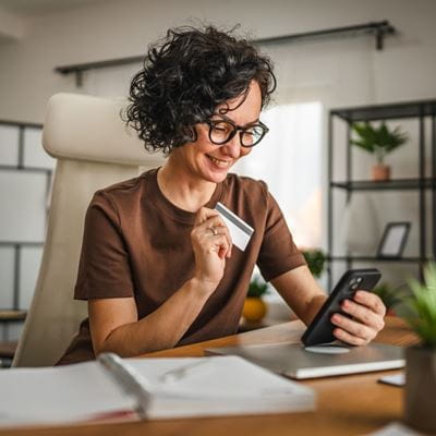 Person paying bill online.