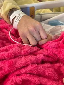 Hand holding in the hospital