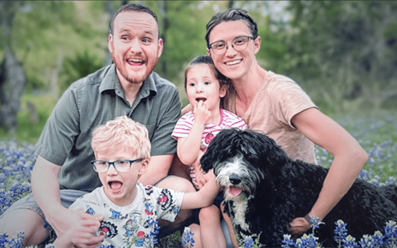 University Health patient, Malea Potter and her family in a field of flowers. 